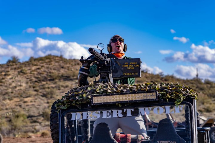 a man riding on the back of a truck