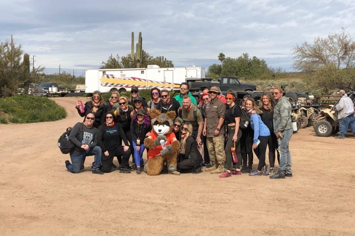 Sunny the Desert Wolf with a Corporate Group