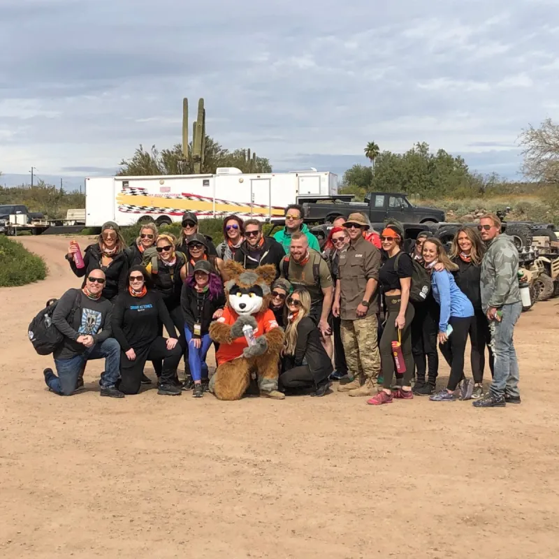 Sunny the Desert Wolf with a Corporate Group