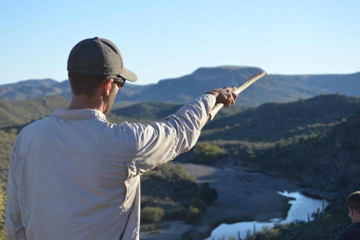 a man standing on top of a mountain